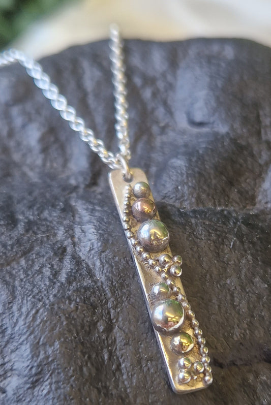 The Caddis Pendant